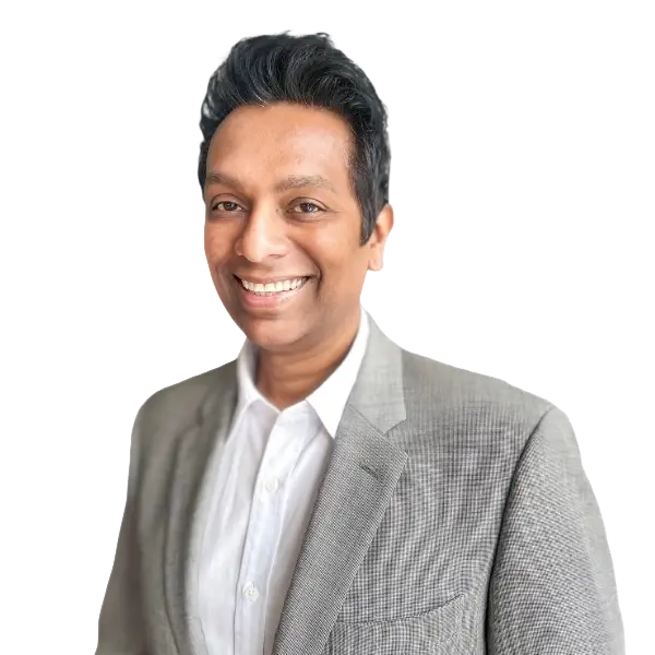 Dan Duthie Visavie Ontario Advisor Warm smiling professional man in gray suit for senior living community services.